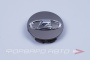 Колпачок литых дисков для автомобиля ВАЗ 2180 VESTA, LADA X-RAY R-16/17 графит с хромированным знаком (железн. обод) ПЛАСТИК 8450032831