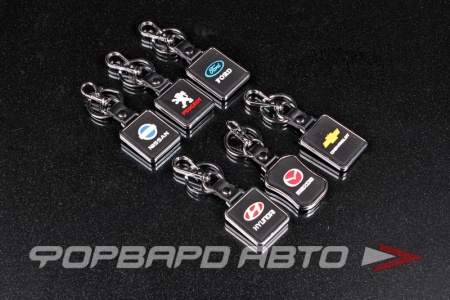 Купить Брелок автомобильный резиновый с карабином и хром окантовкой <> 